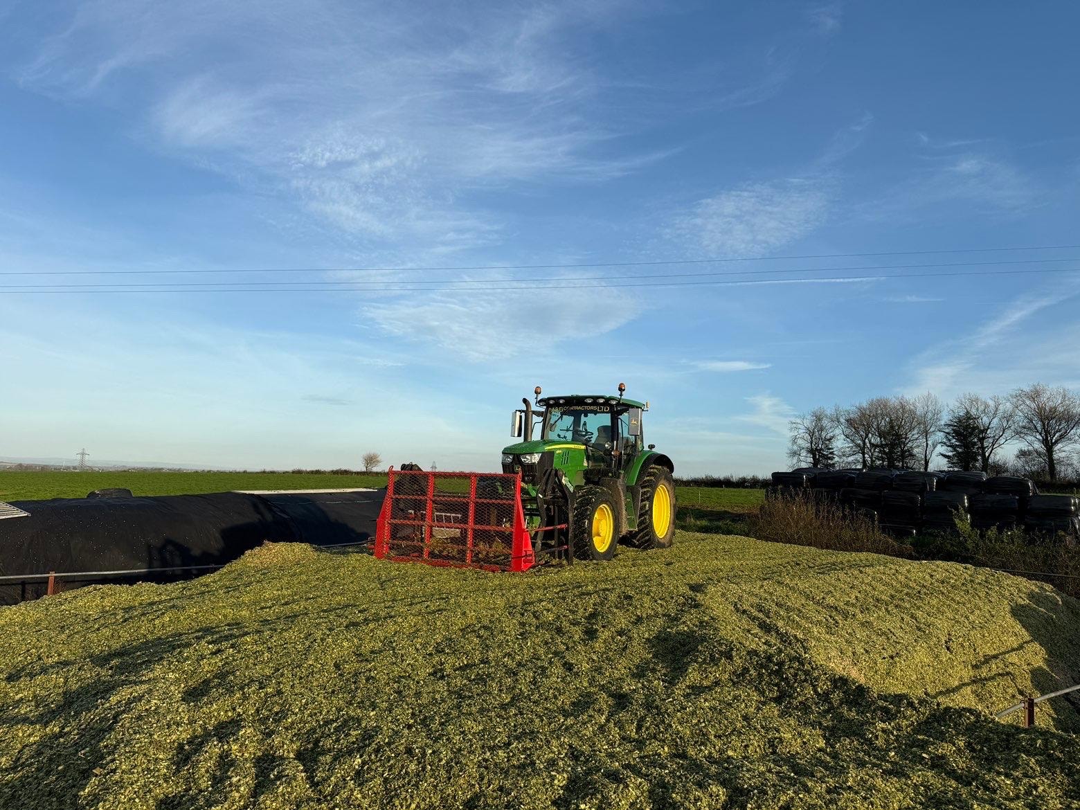 Tractor spreading — farmland
